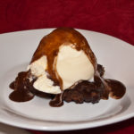 picture of hot fudge pudding topped with ice cream